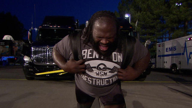 Mark Henry pulling two trucks