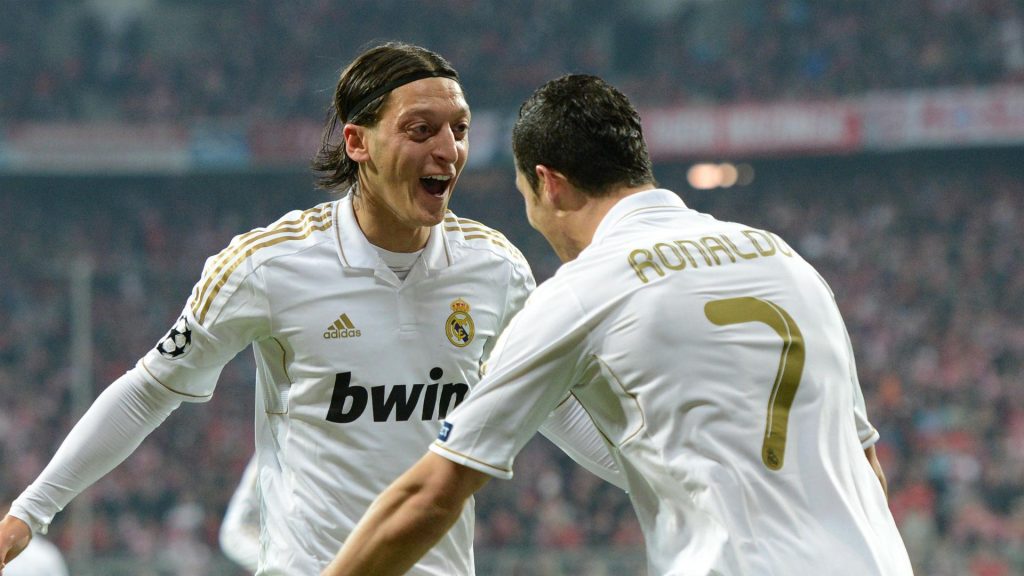 Real Madrid Mesut Ozil celebrates with Cristiano Ronaldo