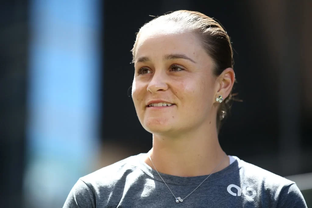 Ashleigh Barty wears her kid Hayden in a sling and posts a photo of him wearing a bucket hat