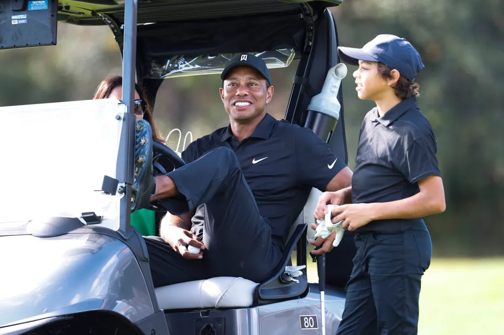 Charlie Woods was spotted practicing with his father, Tiger Woods, stoking curiosity about his participation in the PNC Championship