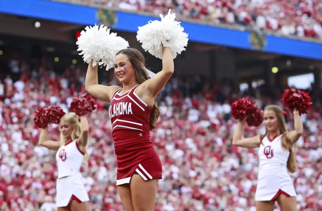 Wild Photos Of Oklahoma Cheerleader Going Viral Before Texas Game